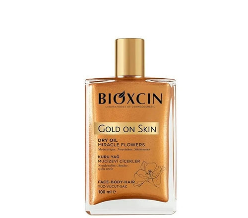 روغن مرطوب کننده و شاین صورت و بدن و مو بیوکسین Bioxin مدل Gold On Skin حجم 100 میل